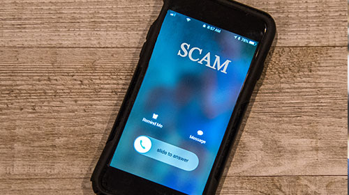 cell Phone showing call from, Scam