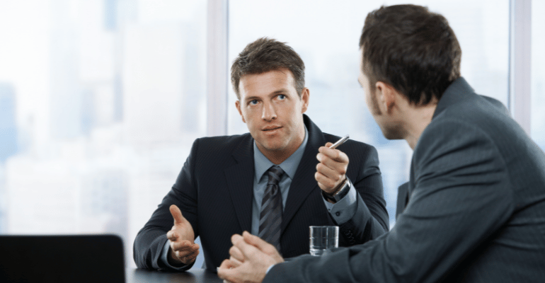Employer reprimanding employee for discussing pay