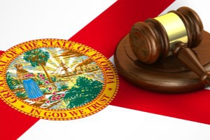 A gavel and a Florida seal