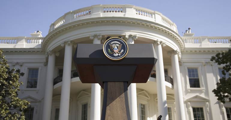 Photo of White House with Presidential Podium