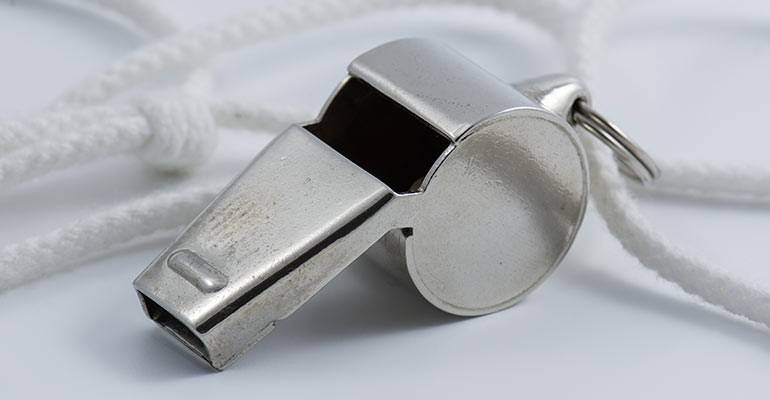 whistle with white cord