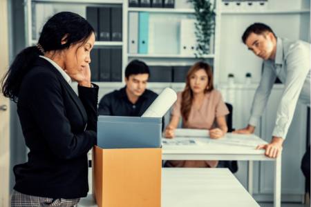 Person upset after being fired from their workplace