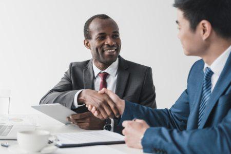 Person asking lawyer, "Can you work for a company after you sue them."