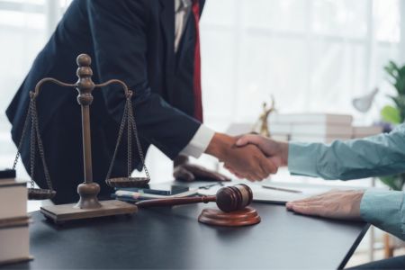 legal representation meeting to resolve workplace retaliation dispute