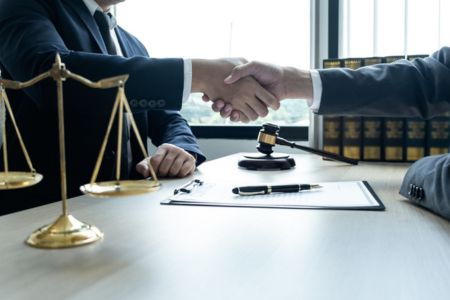 Attorney helping restaurant worker with a tip pooling Florida wage dispute