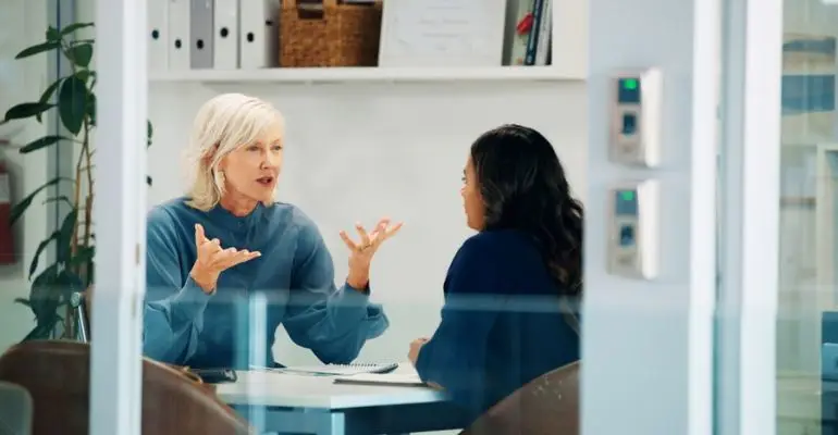 employee discussing a workplace complaint with an HR representative