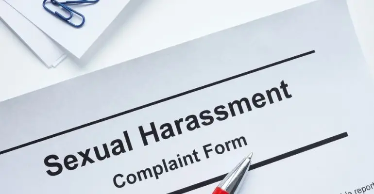 paper with Sexual Harassment Complaint Form heading