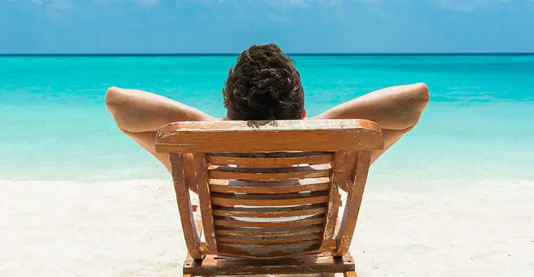 man relaxing on the beach