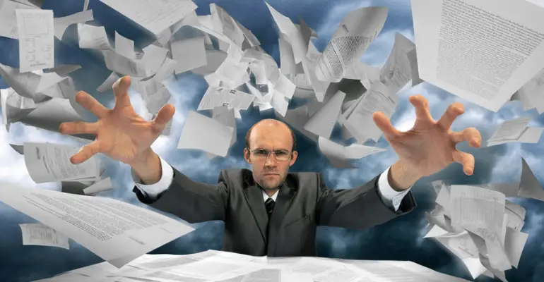 Man throwing legal papers all over the place